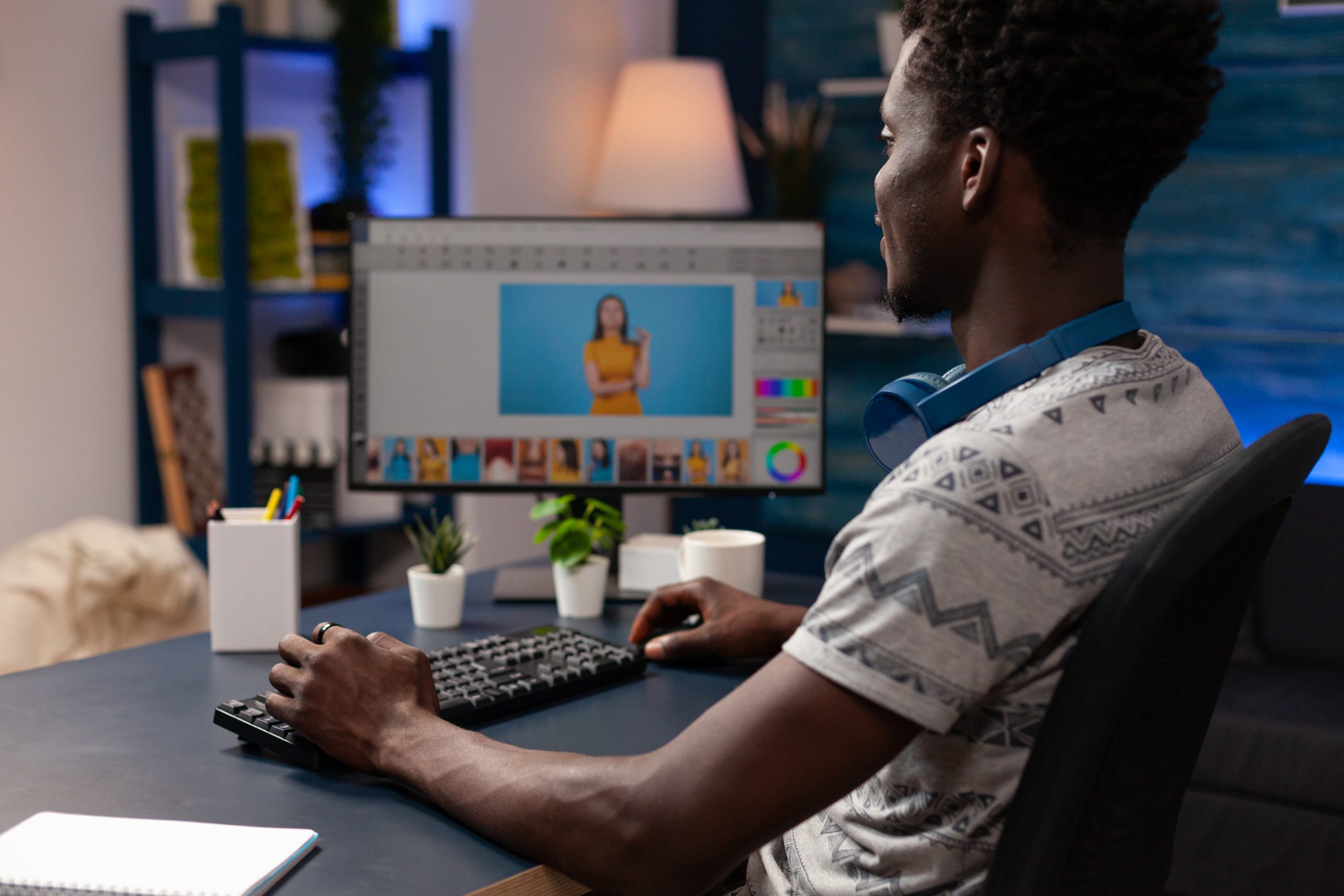 african american photographer editing image using pictures retouching